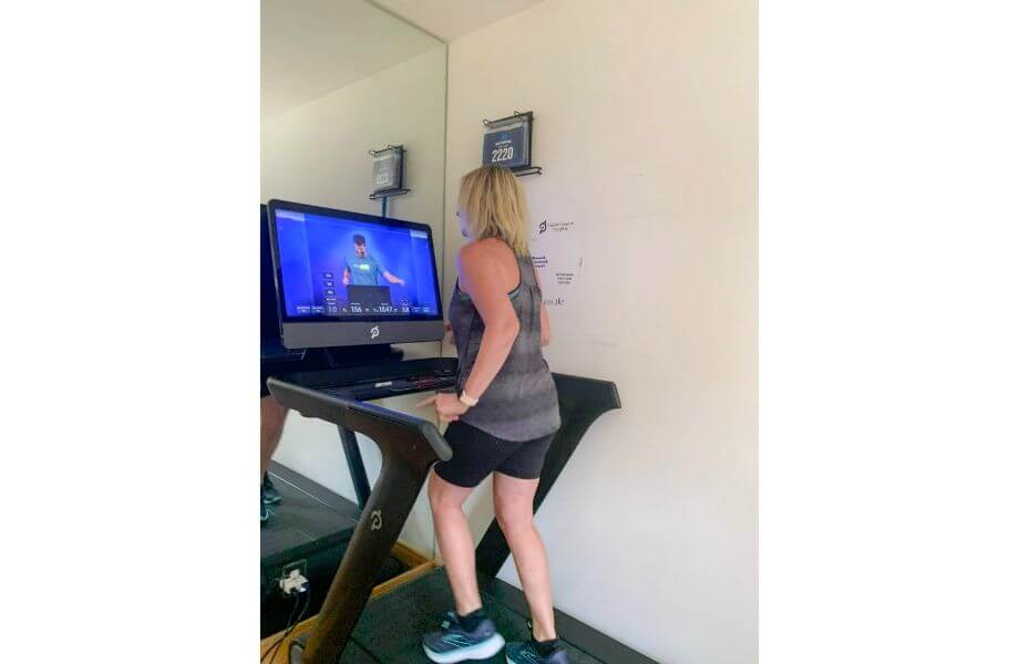 woman using peloton tread